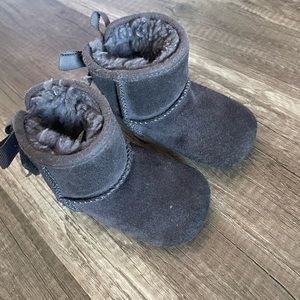 UGGS. Adorable baby girl uggs in greyish/purple color